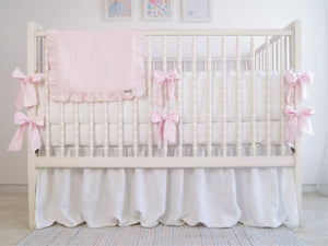 White linen crib bumper with pink  ties